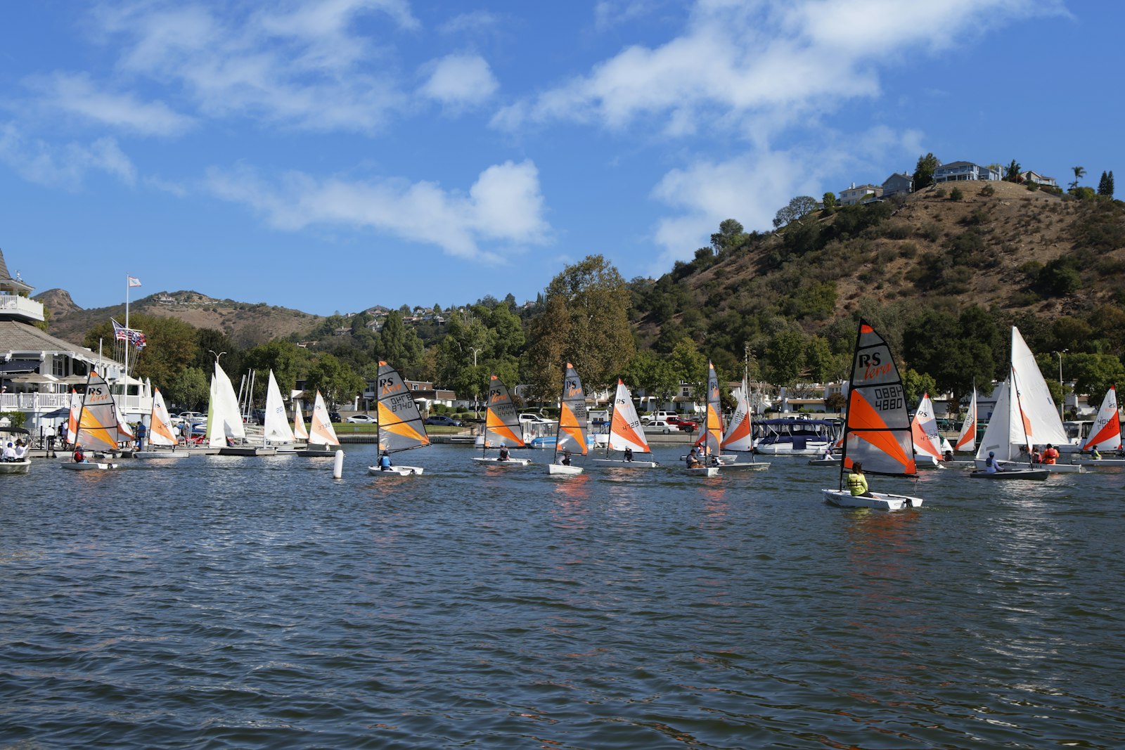 The training fleet sailing together near the shore